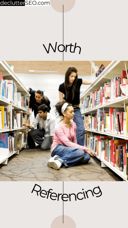 Adult Students in a library looking up specific information in books